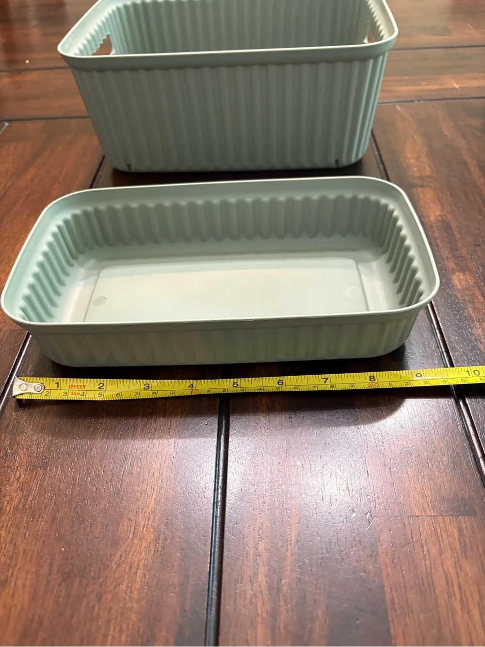 Set of 7 sage green plastic storage containers